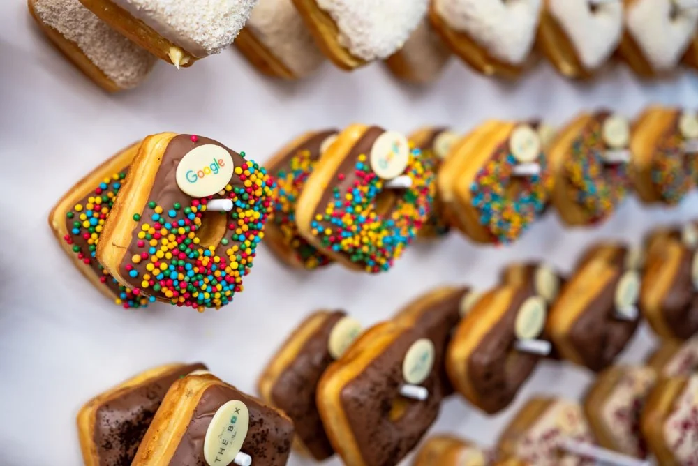 Square donuts topped with colourful sprinkles